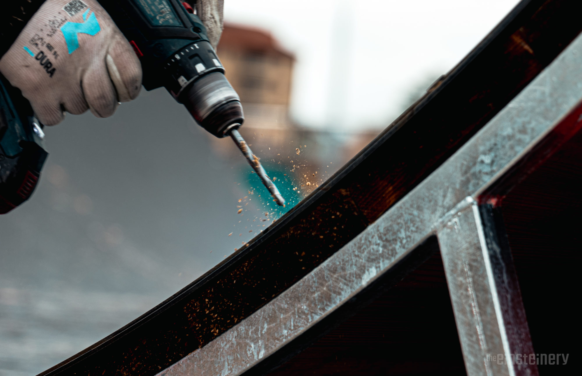 A drill close-up doing pieces of wood
